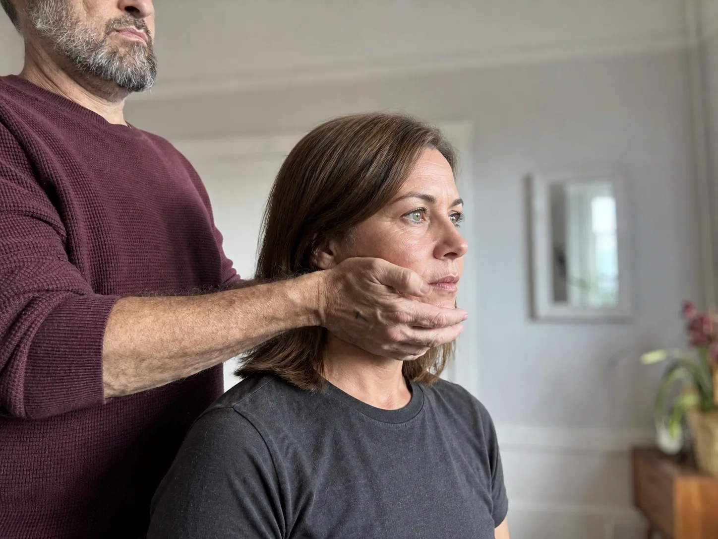 Illustrative editorial image of a guided jaw and neck position
