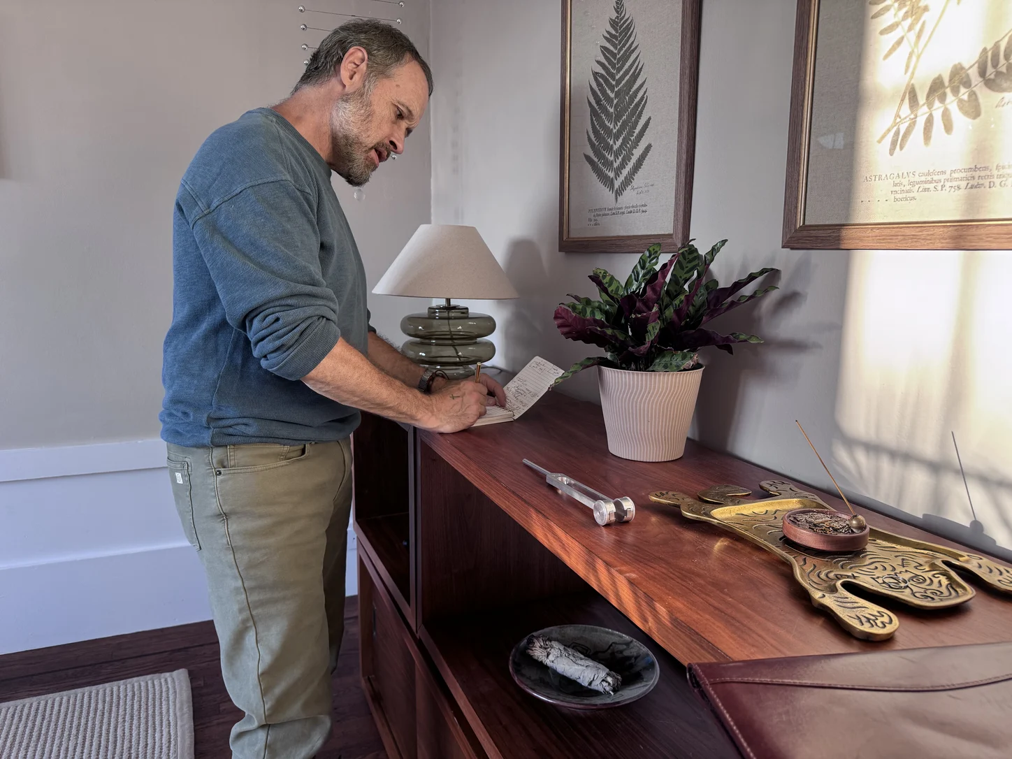 Garrett preparing notes in the Amari studio